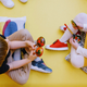 Joyful children playing maracas in a colorful preschool setting